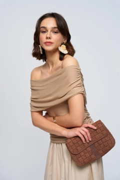 A wholesale clothing model wears tbu12786-madonna-collar-gathered-knitwear-women's-blouse-beige, Turkish wholesale Blouse of Tuba Butik