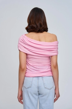 A wholesale clothing model wears tbu12795-madonna-collar-gathered-knitwear-women's-blouse-pink, Turkish wholesale Blouse of Tuba Butik