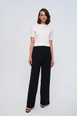 A wholesale clothing model wears tbu12800-women's-palazzo-trousers-with-darts-black, Turkish wholesale  of 