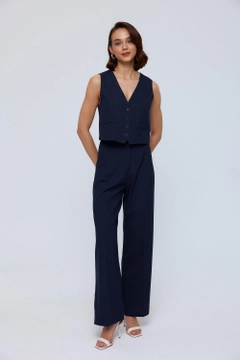 Ein Bekleidungsmodell aus dem Großhandel trägt tbu12038-straight-cut-women's-vest-navy-blue, türkischer Großhandel Weste von Tuba Butik