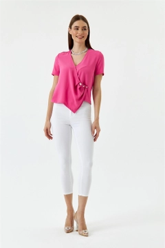 Ein Bekleidungsmodell aus dem Großhandel trägt tbu12745-high-waist-lycra-skinny-women's-jeans-white, türkischer Großhandel Hose von Tuba Butik