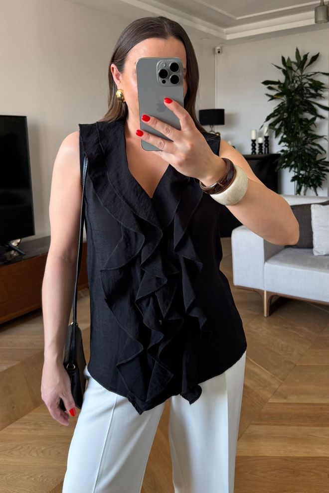 Tuba Blusa Con Volant A Maniche Zero Nera Abbigliamento all'ingrosso Elegante