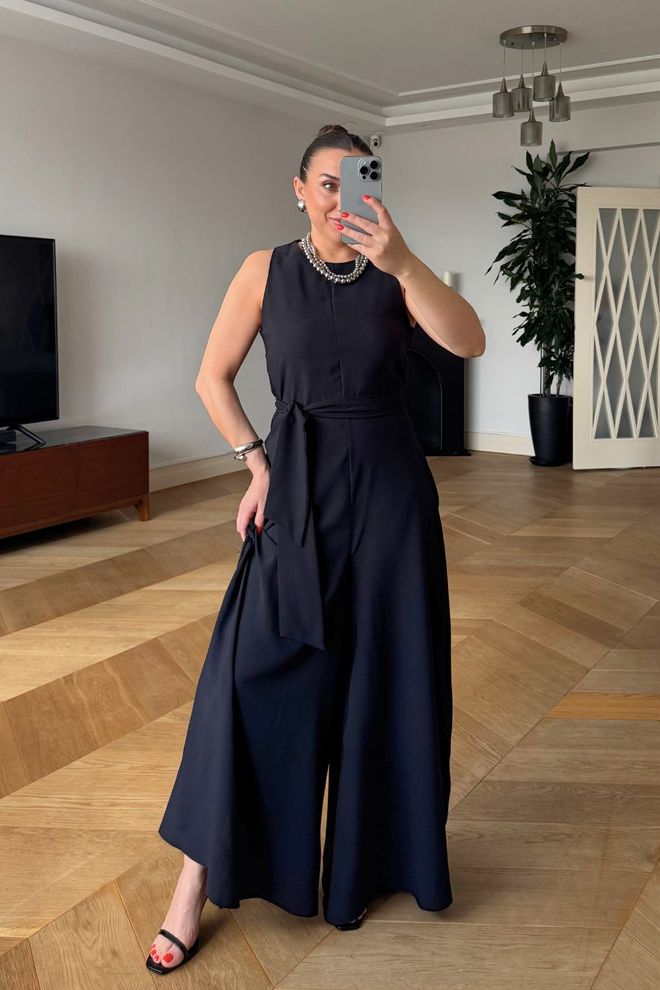 Tuba Tuta Da Donna Zero Sleeve Loose Leg Nera Abbigliamento all'ingrosso Elegante