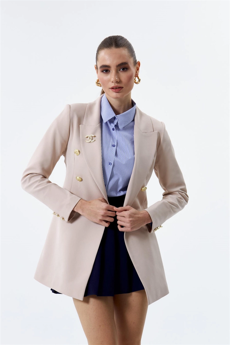A model wears TBU10248 - Double Breasted Women's Blazer Jacket - Beige, wholesale Jacket of Tuba Butik to display at Lonca