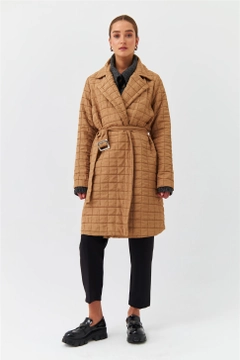 A wholesale clothing model wears TBU10317 - Modest Quilted Long Belt Slim Women's Jacket - Light Brown, Turkish wholesale Jacket of Tuba Butik