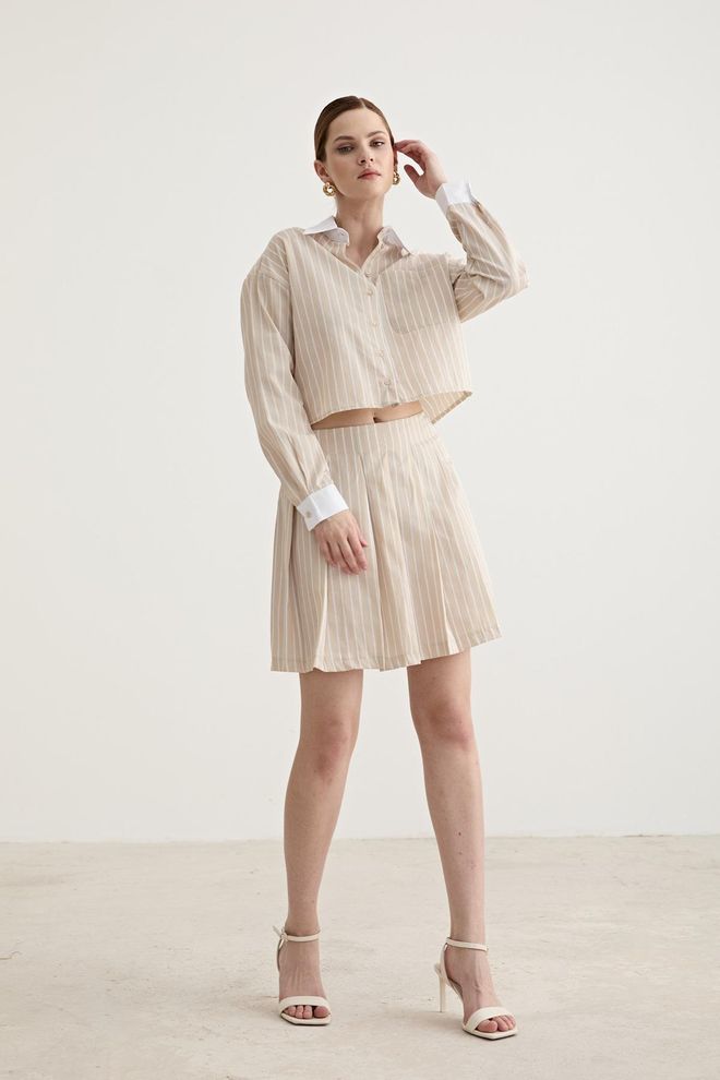 Umay Gonna Pieghettata Mini Beige Vita Alta Con Cerniera Abbigliamento all'ingrosso Casuale