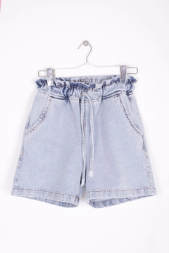 A wholesale clothing model wears 37356 - Denim Shorts - Light Blue, Turkish wholesale Denim Shorts of XLove