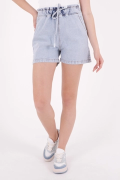A wholesale clothing model wears 37356 - Denim Shorts - Light Blue, Turkish wholesale Denim Shorts of XLove