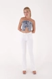 Una modella di abbigliamento all'ingrosso indossa 37503-jeans-white, vendita all'ingrosso turca di  di 