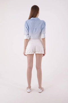 A wholesale clothing model wears XLO10061 - Denim Shorts - White, Turkish wholesale Denim Shorts of XLove