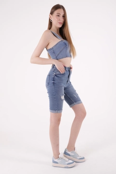 A wholesale clothing model wears XLO10111 - Denim Shorts - Blue, Turkish wholesale Denim Shorts of XLove