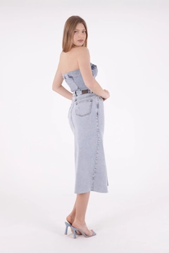 A wholesale clothing model wears xlo10118-tassel-covered-skirt-with-front-slit-light-blue, Turkish wholesale Skirt of XLove