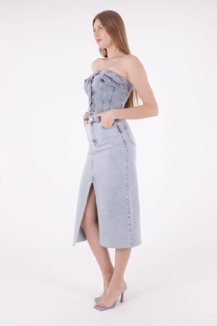 A wholesale clothing model wears xlo10118-tassel-covered-skirt-with-front-slit-light-blue, Turkish wholesale Skirt of XLove
