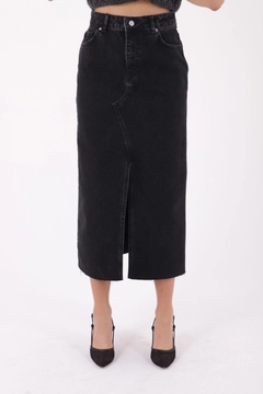 A wholesale clothing model wears xlo10154-denim-skirt-with-front-slit-and-tassels-anthracite, Turkish wholesale Skirt of XLove