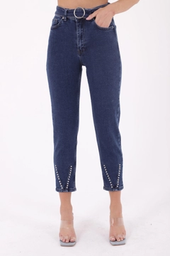 A wholesale clothing model wears xlo10156-dropped-and-extra-detailed-mom-fit-jean-dark-blue, Turkish wholesale Jeans of XLove