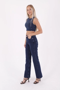 A wholesale clothing model wears xlo10224-stitched-wide-leg-relax-jeans-dark-blue, Turkish wholesale Jeans of XLove