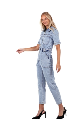 A model wears 37370 - Denim Jumpsuit - Light Blue, wholesale undefined of XLove to display at Lonca