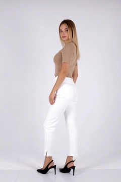Модель оптовой продажи одежды носит 45220 - Jeans - White, турецкий оптовый товар Джинсы от XLove.